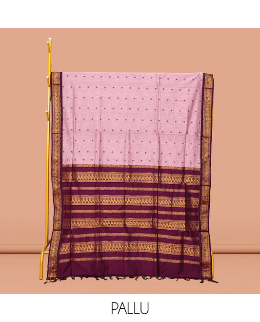 Pink Kalyani Cotton Saree, Decked Up with Thread Buttas All Over Its Body, Complemented by a Contrast Traditional Zari Design Border, Pallu Steeped with Peacock Designs, and Paired with a Contrast Blouse