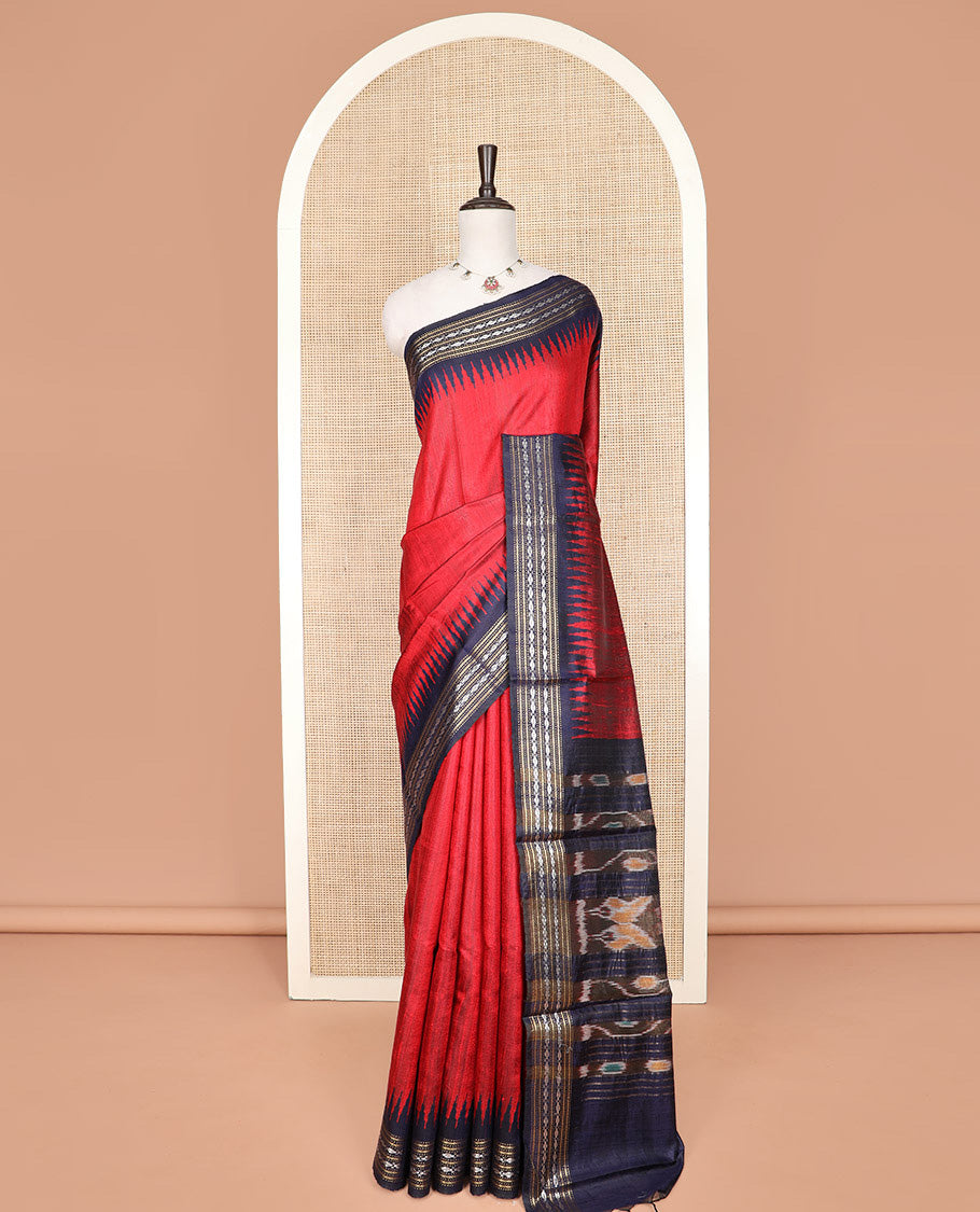 Red Plain Dupion Silk Saree, Complemented by a Contrast Temple Border  of Traditional Motifs in Thread, Pallu of Ikkat Designs, and Paired with a Contrast Blouse