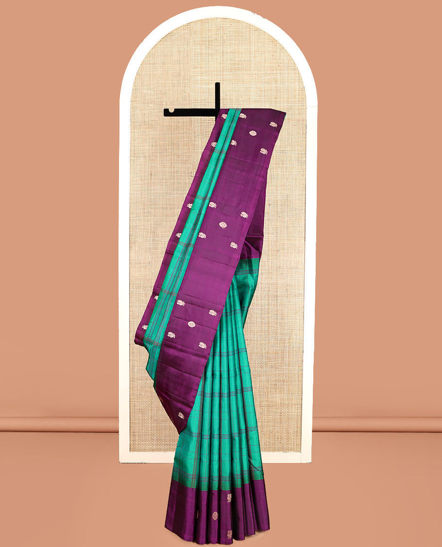 Green Checked Kanchipuram Silk Saree, Complemented by a Contrast Mayil-Chakram Border, Pallu of Butta Enclosed Checks, and a Contrast Blouse