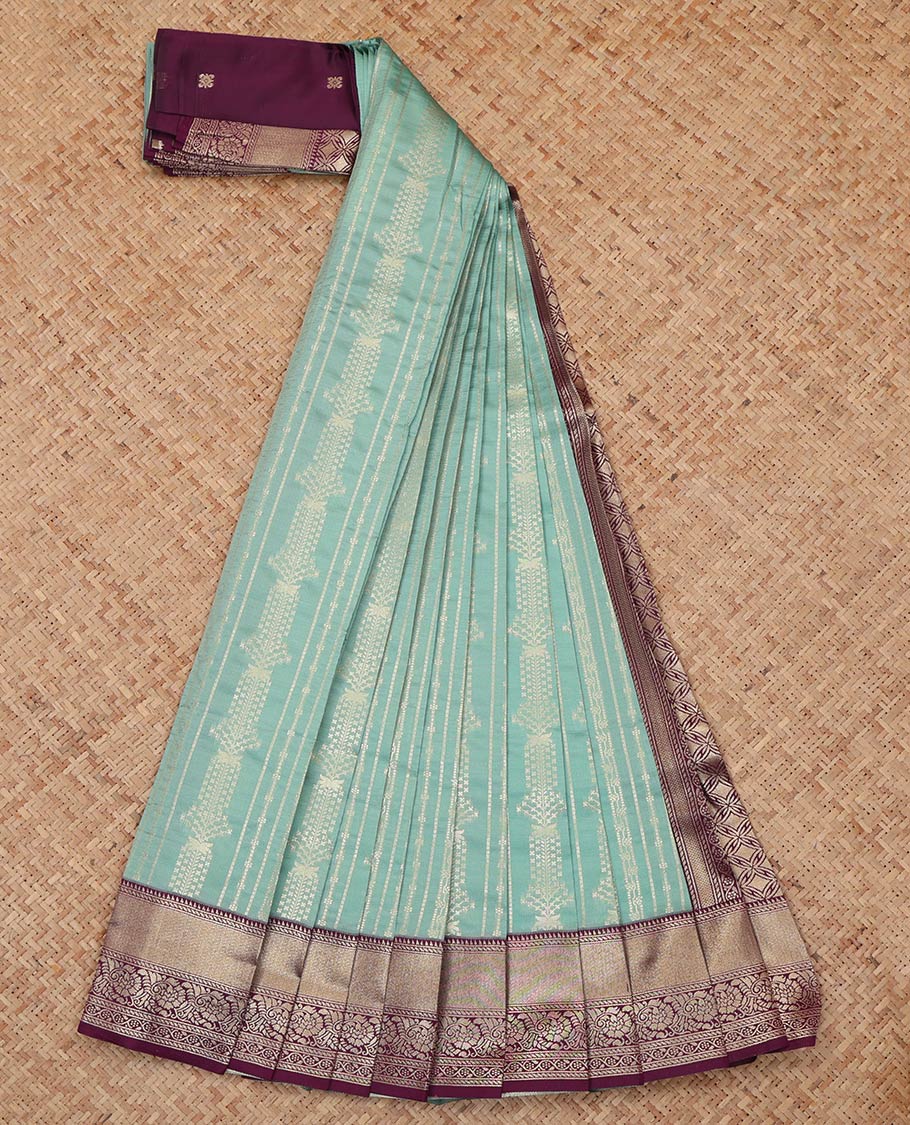 Blue Litchi Saree, Beautifully Bedecked with Zari Designs, a Contrast Traditional Zari Border, Jaal Pallu, and a Contrast Blouse