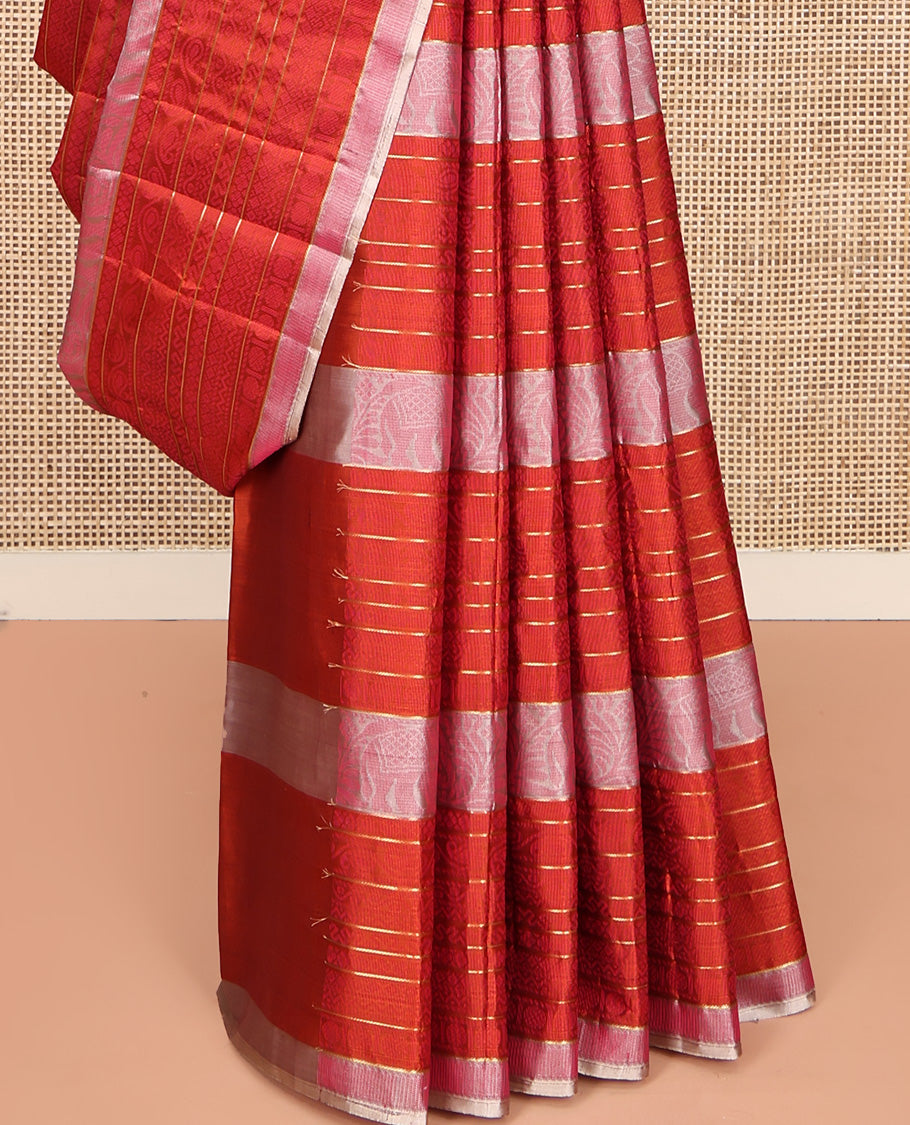 Borderless Orange Mayuri Soft Silk Saree, Elevated with Stripes and Elephant Motifs, Pallu Steeped with Geometric Patterns, and Paired with a Contrast Blouse