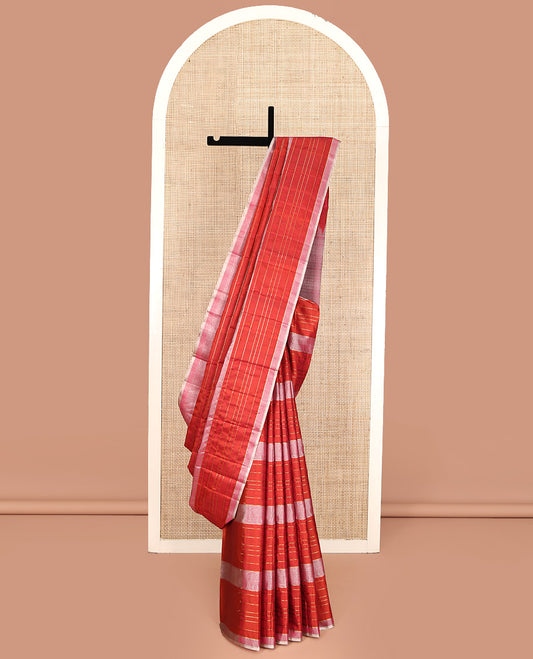 Borderless Orange Mayuri Soft Silk Saree, Elevated with Stripes and Elephant Motifs, Pallu Steeped with Geometric Patterns, and Paired with a Contrast Blouse