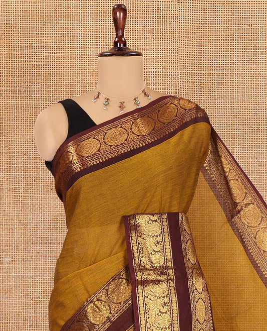 Mustard Chettinad Cotton Saree, a Contrast Peacock-Chakra Rettai Pettu Border, Striped Pallu, and Matching Blouse