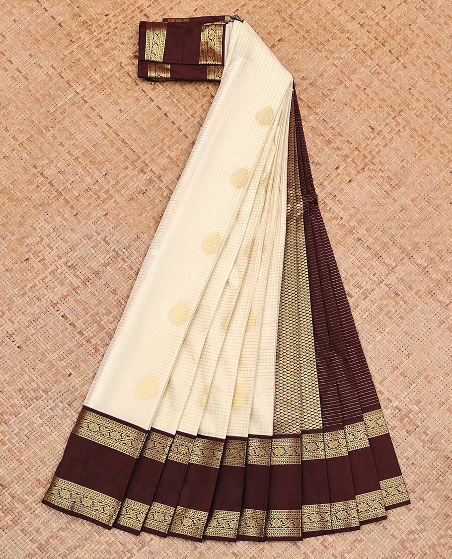Cream Budget Silk Saree, Entralled with Zari Buttas and Checks On Its Body, Complemented by Contrast Rettai Pettu Border of Traditional Zari Designs, Grand Jaal Pallu and Paired with a Contrast Blouse
