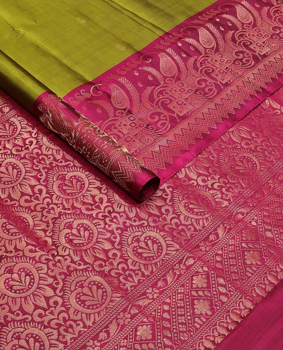 Green manga buttas soft silk saree, contrast border, and pallu of intricate zari designs