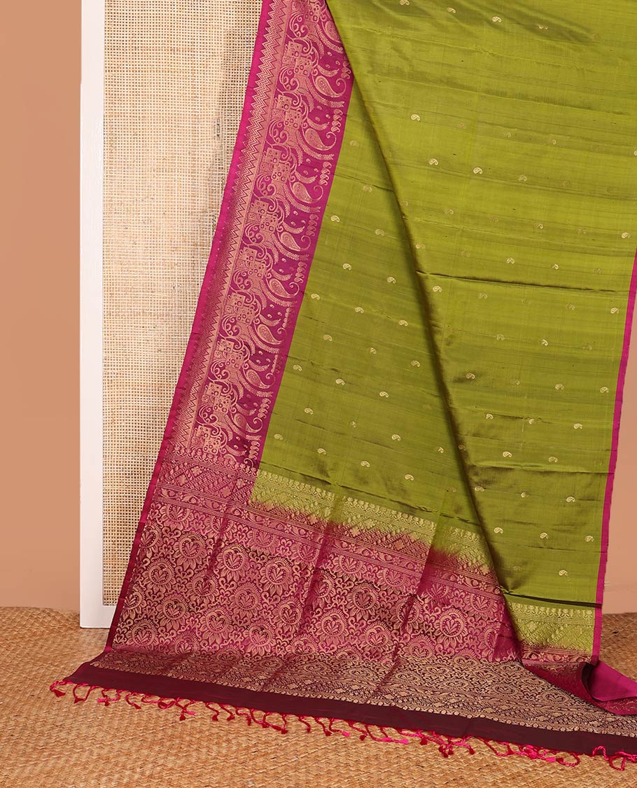 Green manga buttas soft silk saree, contrast border, and pallu of intricate zari designs