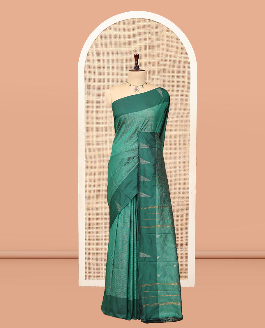 Green Arani Saree, Steeped with Zari Stripes, a Contrast Temple Border, Pallu of Zari Designs, and a Matching Blouse