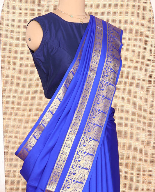 Blue Plain Mysore Silk Saree, Richly Detailed with Zari Border of Peacock Designs, Sparsely Woven Pallu of Stripes, and Paired with a Matching Blouse