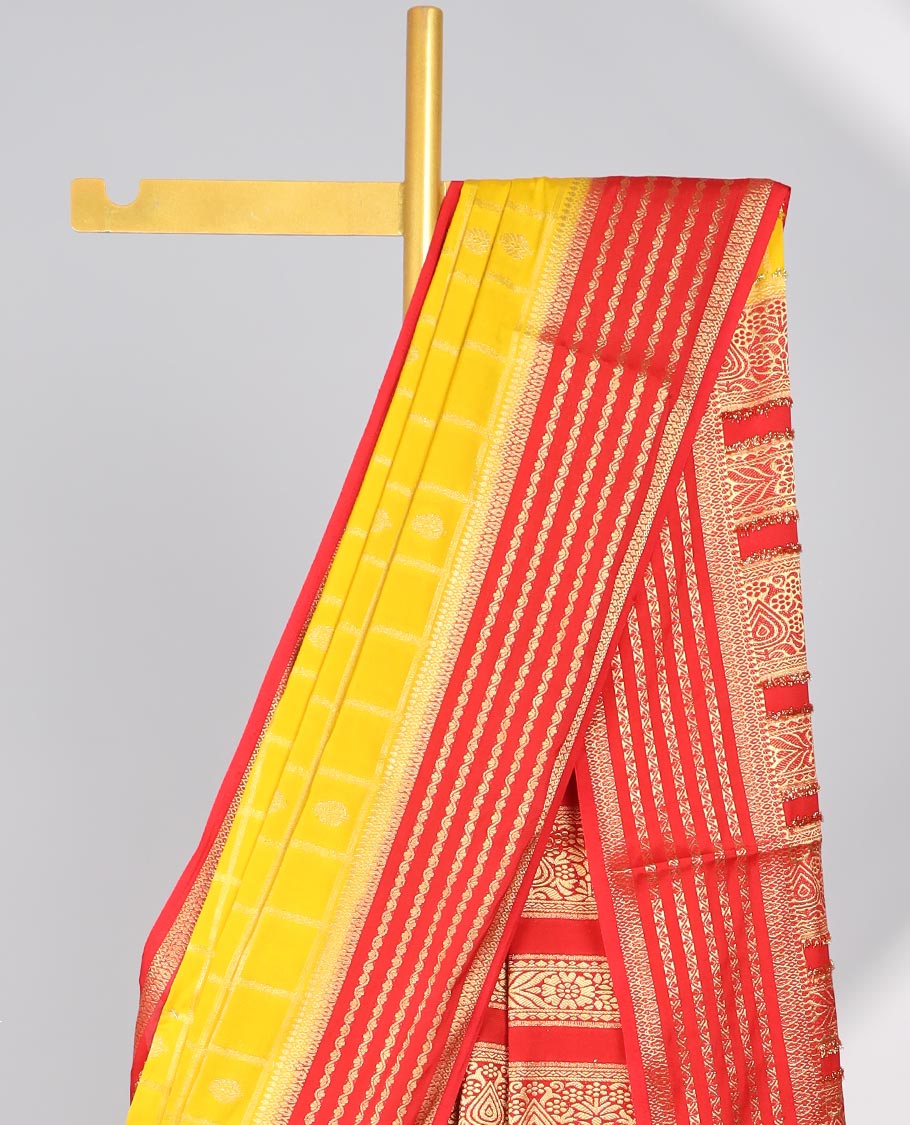 Yellow floral motifs enclosed with checked mysore silk saree with contrast striped zari border & pallu of intricate design