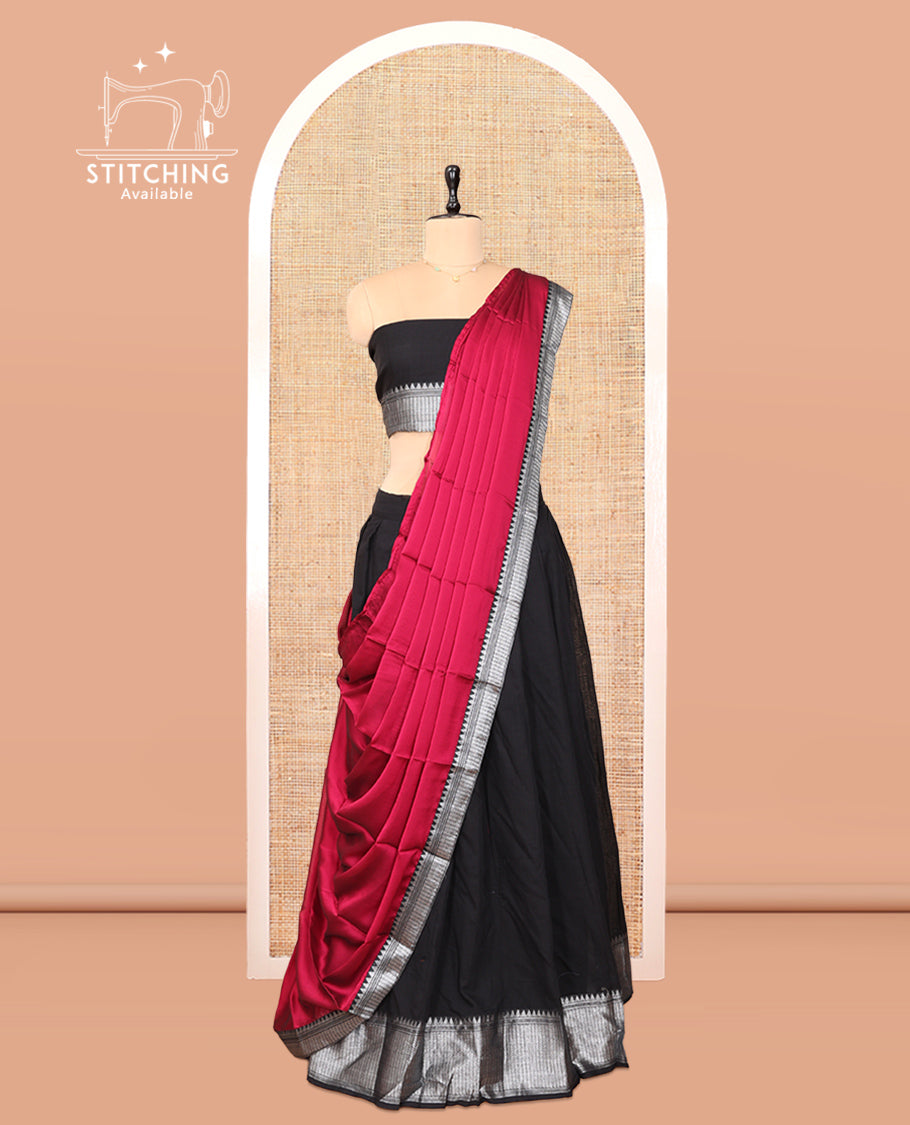 Black Cotton Half-Saree Features Plain Skirt, a Traditional Border, a Matching Blouse, and a Contrast Dhavani