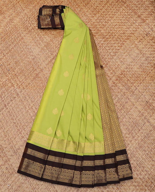 Green Budget Silk Saree, Adorned with Zari Buttas All Over Its Body, Complemented by Contrast Traditional Zari Designs Woven Border, Grand Jaal Pallu and Paired with a Contrast Blouse