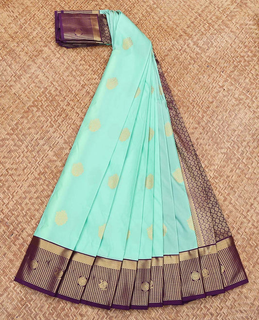 Turquoise Budget Silk Saree, Beautified with Zari Buttas on Its Body, Complemented by a Contrast Zari Checked Border of Peacock and Chakram Designs, Grand Jaal Pallu, and Paired with a Contrast Blouse