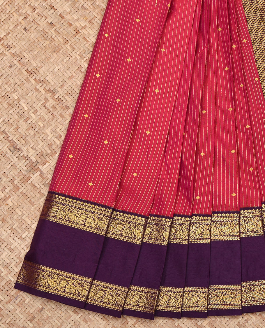 Red Budget Silk Saree, Subtly Sparkled with Buttas and Stripes All Over Its Body, Complemented by a Contrast Traditional Zari Design Rettai Pettu Border, Grand Jaal-Patterned Pallu, and Paired with a Contrast Blouse