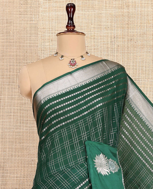 Green Assam Silk Saree, Beautified with Zari Checks, Highlighted by a Traditional Zari Border, Floral Butta Enclosed Checks Pallu, and a Matching Blouse