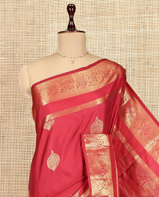 Red Budget Silk Saree, Featuring Zari Buttas, Highlighted by a Traditional Zari Rettai Pettu Border, Grand Pallu, and a Matching Blouse