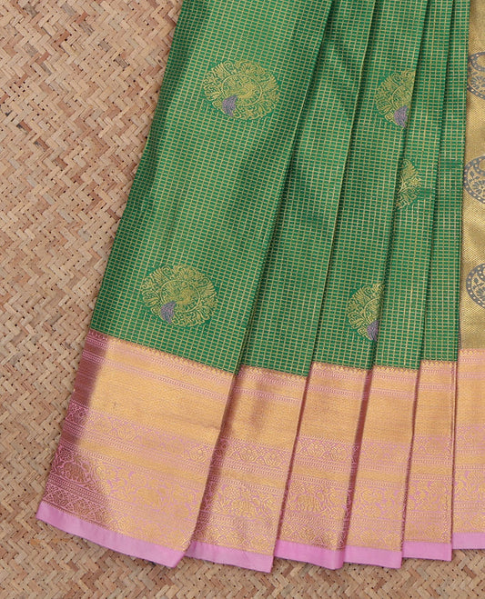 Green Budget Silk Saree, Spotlighted with Peacock Buttas and Checks, a Contrast Traditional Zari Border, an Intricate Pallu and a Contrast Blouse
