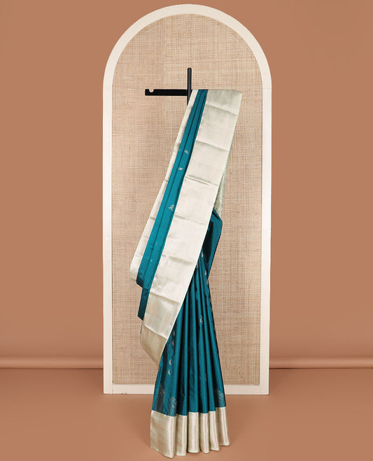 Peacock blue zari buttas gift saree, contrast traditional zari design border, and zari woven pallu