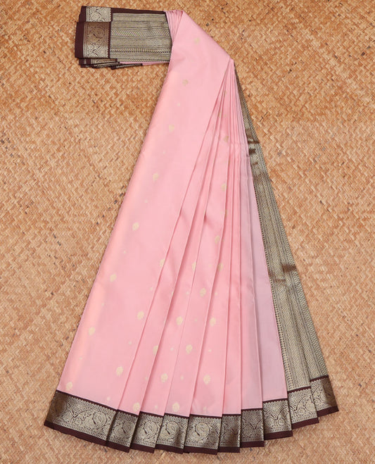 Pink Budget Silk Saree, Sparsely Woven with Zari Buttas All Over Its Body, Complemented by Contrast Border of Peacock Designs, a Masterfully Woven Pallu of Geometric Designs, and Paired with a Contrast Blouse