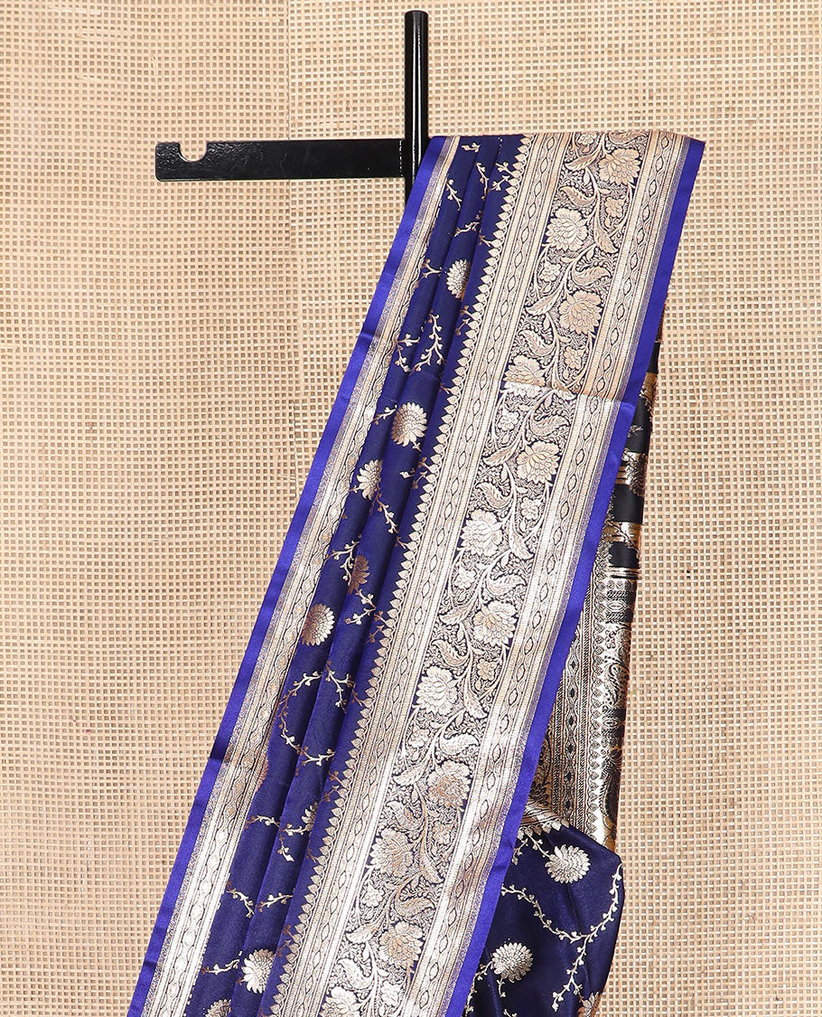 Navy blue floral jaal jacquard banarasi silk saree, contrast floral creeper design border, and intricate ogee patterned pallu