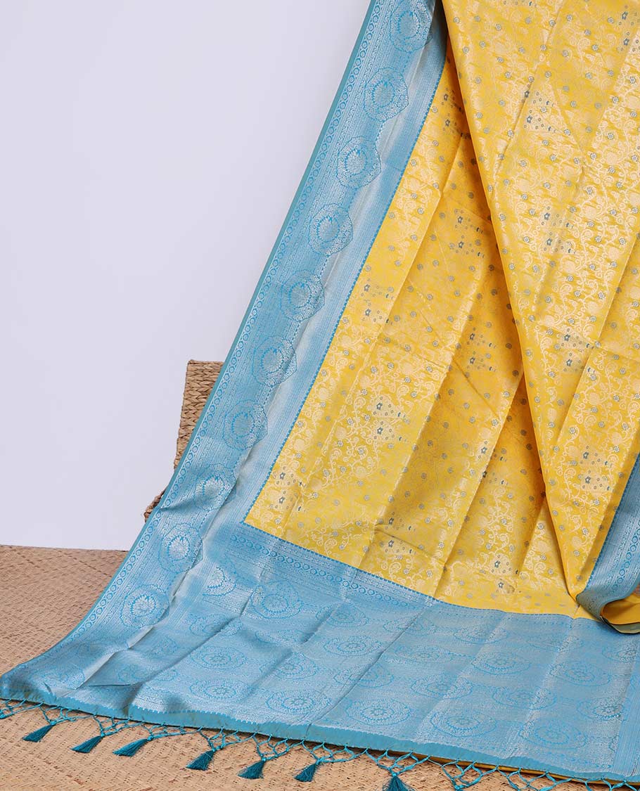 Green floral butter silk saree with contrast floral design border & pallu of floral jaal design