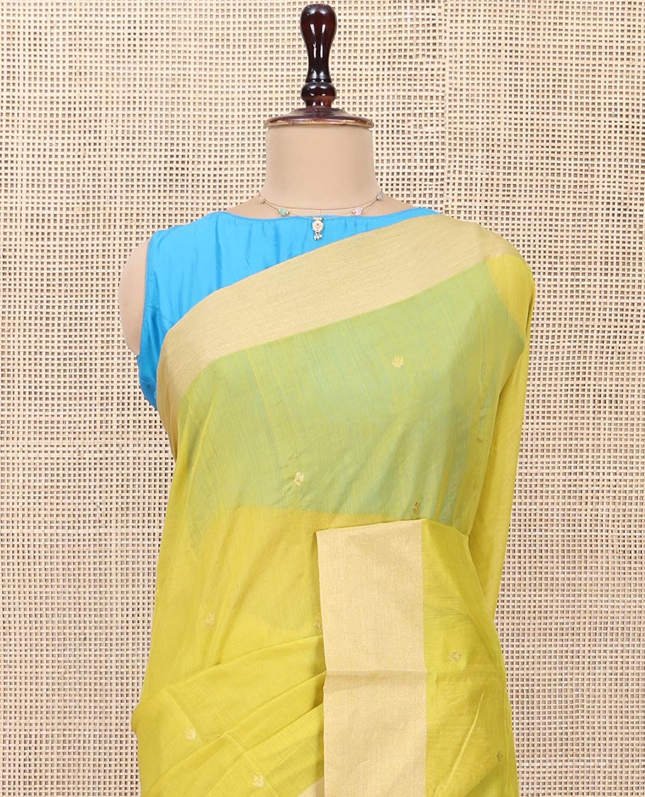 Yellow Chanderi Cotton Saree, Subtly Sparkled with Buttas All Over Its Body, Subtly Woven Bavanji Border, Complemented by a Contrast Pallu of Floral Designs, and Paired with a Contrast Blouse