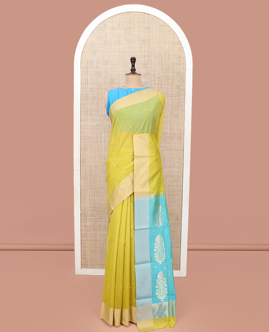 Yellow Chanderi Cotton Saree, Subtly Sparkled with Buttas All Over Its Body, Subtly Woven Bavanji Border, Complemented by a Contrast Pallu of Floral Designs, and Paired with a Contrast Blouse