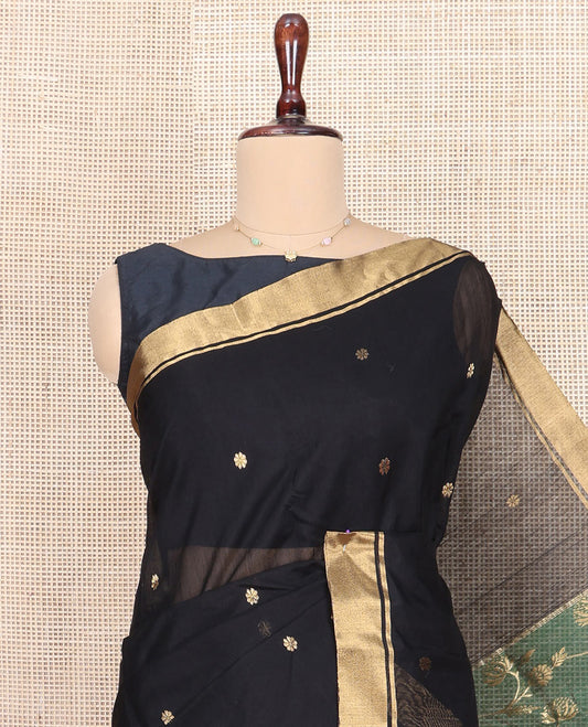 Black Chanderi Cotton Saree, Ornamented with Floral Buttas All Over Its Body, Highlighted by Zari Border, Complemented by Contrast Pallu of Floral Jaal Designs, and Paired with a Contrast Blouse