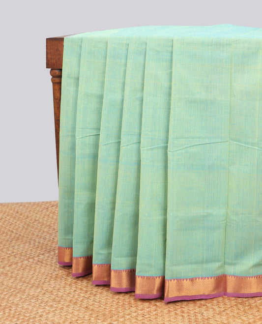 Light green mangalagiri cotton saree with contrast striped, temple border & striped pallu
