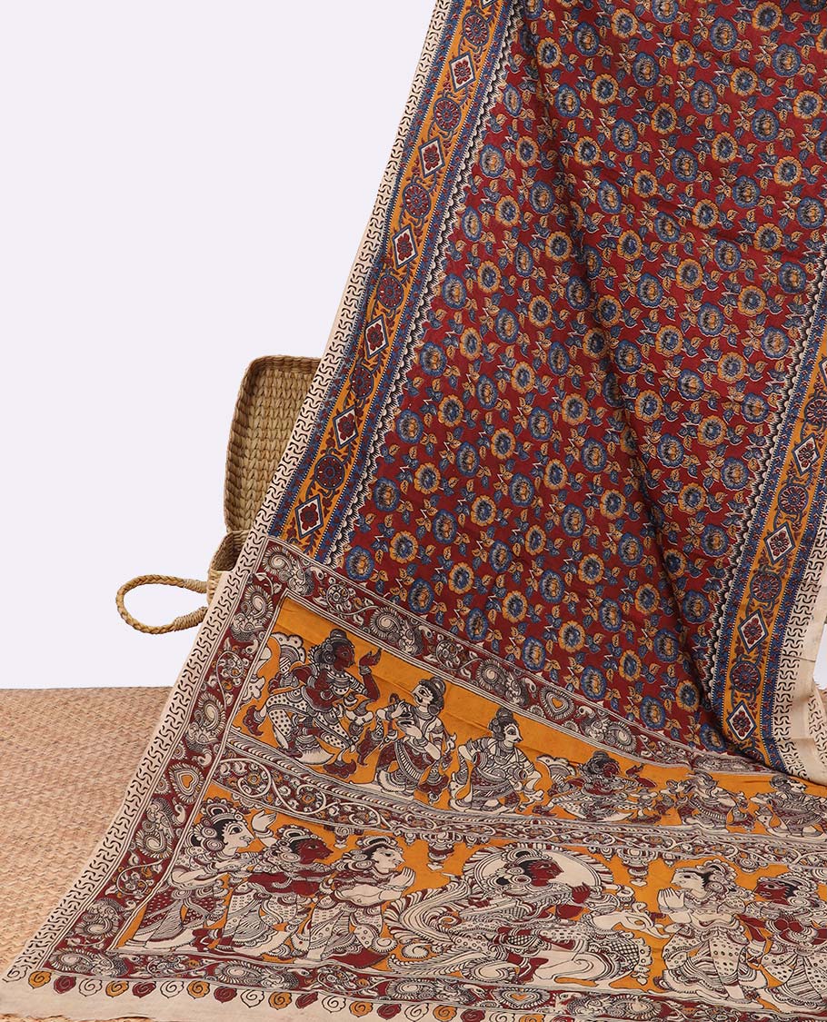 Red floral design machine printed kalamkari cotton saree with contrast floral border & human motifs pallu