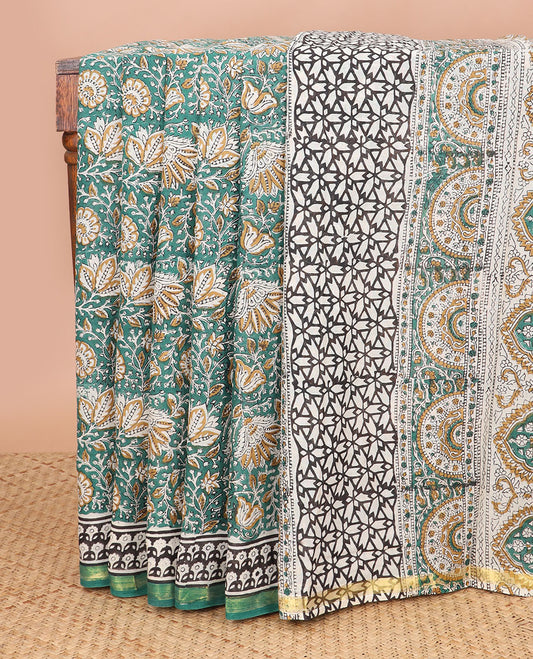 Green floral design machine printed kalamkari cotton saree with contrast zari border & floral design pallu