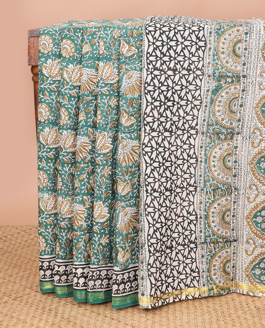 Green floral design machine printed kalamkari cotton saree with contrast zari border & floral design pallu