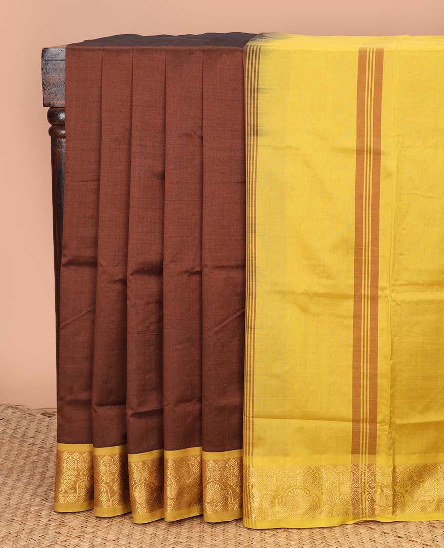 Brown plain design poly cotton saree, contrast traditional zari border, and striped pallu