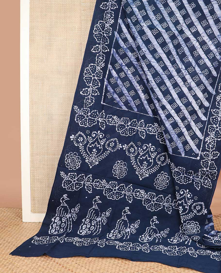 Blue batik printed sungudi cotton saree,  batik printed border, and intricate batik printed pallu