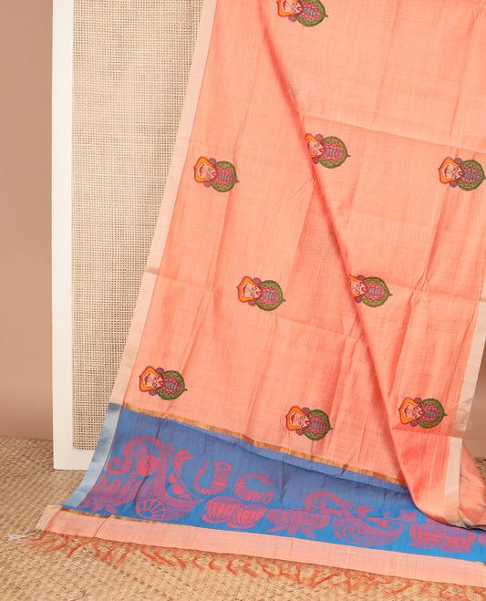 Peach kathakali buttas printed chirala cotton saree, bavanji border, and contrast musical motifs print pallu