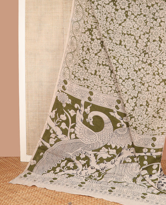 Green floral vine machine-printed kalamkari cotton saree, floral creeper printed border, and pallu of animal motifs print