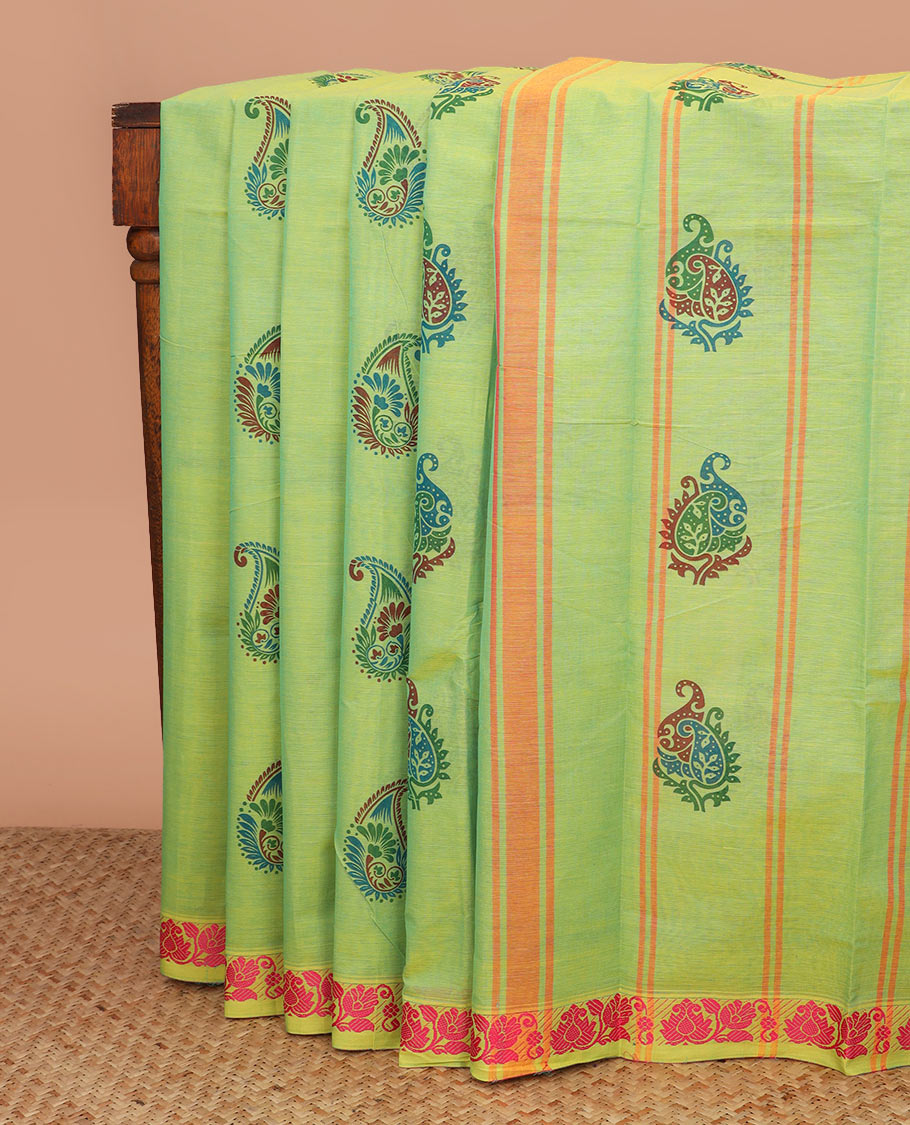 Green paisley buttas Chettinad cotton saree, floral design border, and striped pallu