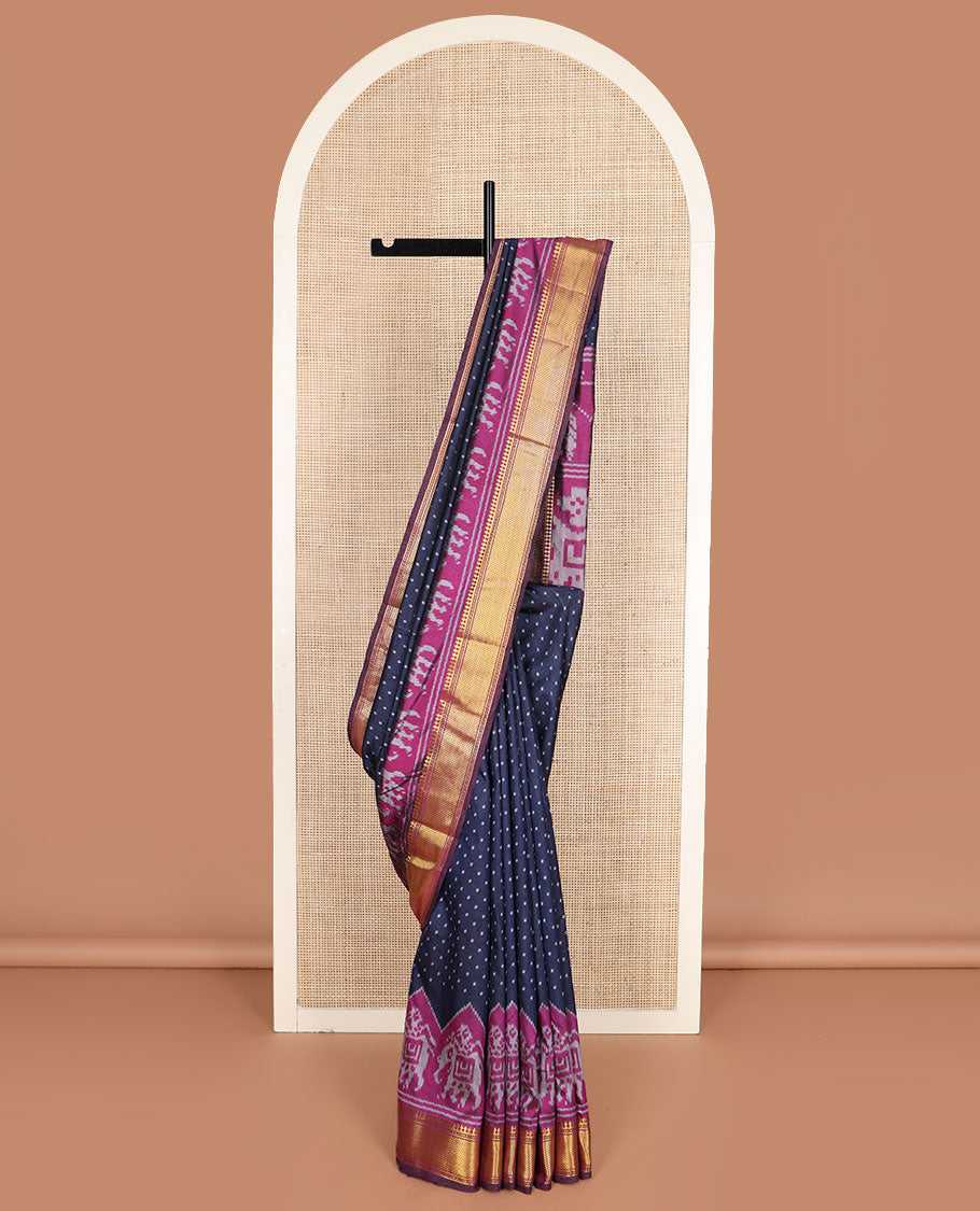 Navy blue buttas semi-banaras patola silk saree, contrast elephant motifs border of traditional zari designs, and pallu of elephant motifs