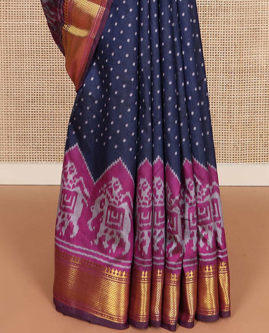 Navy blue buttas semi-banaras patola silk saree, contrast elephant motifs border of traditional zari designs, and pallu of elephant motifs