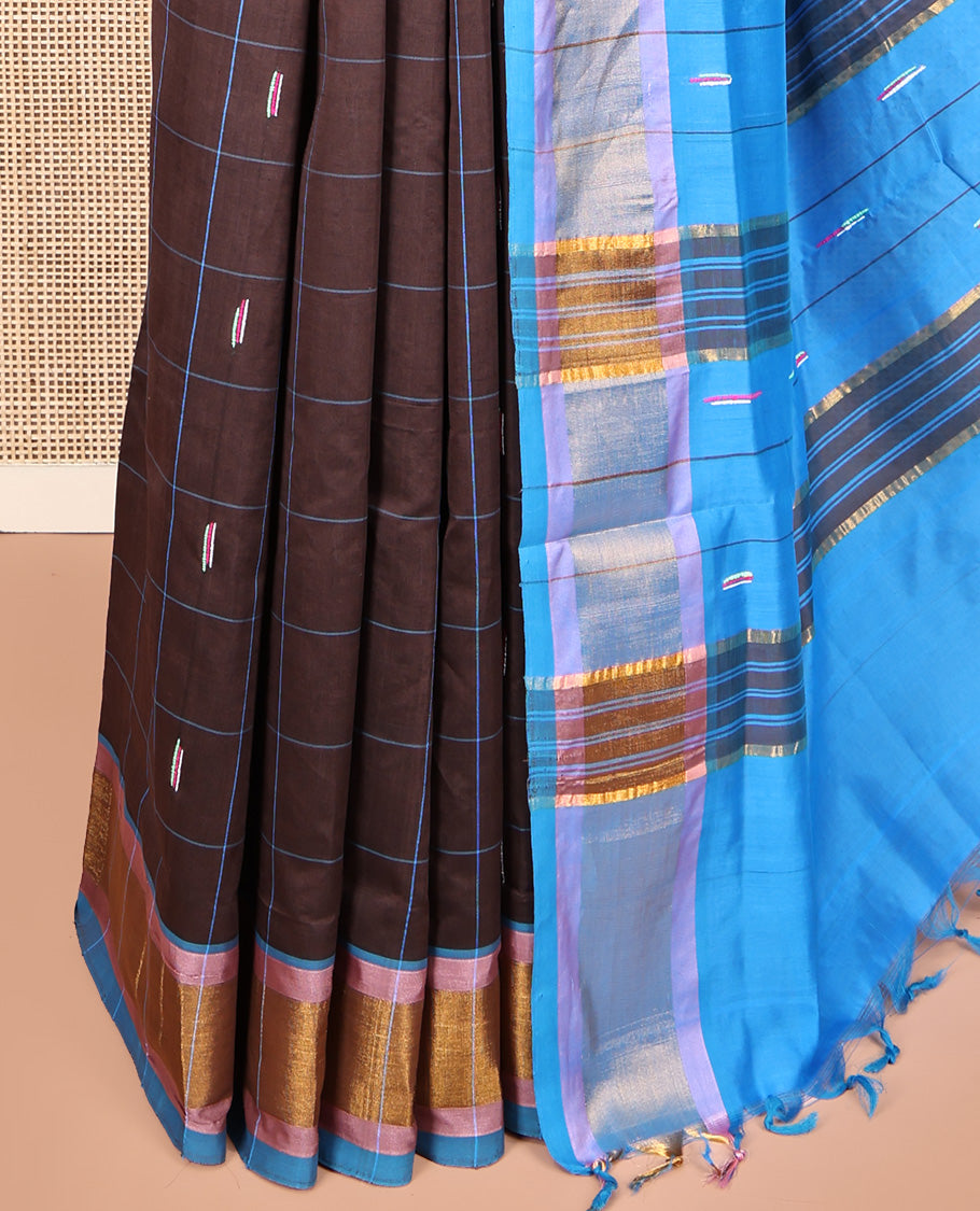 Brown Poly Cotton Saree, Decked Up with Butta Enclosed Checks, Complemented by Contrast Border, Pallu of Buttas and Stripes, and Paired with a Contrast Blouse
