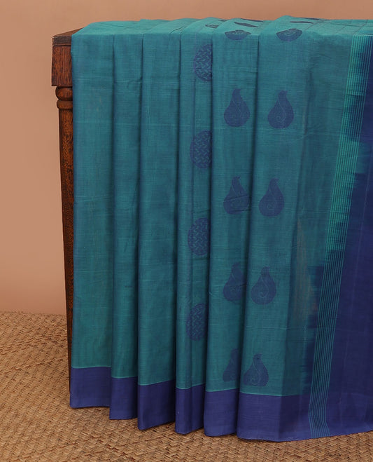 Blue unique buttas kanchi cotton saree, contrast plain border & pallu of lotus vine designs