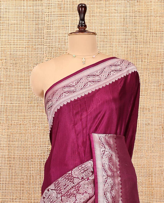 Purple Matka Silk Saree, Richly Detailed with Skirt-Border-Style Geometric Zari Patterns On Its Body, Highlighted by Zari Border, Grandly Zari Woven Pallu, and Paired with a Contrast Blouse