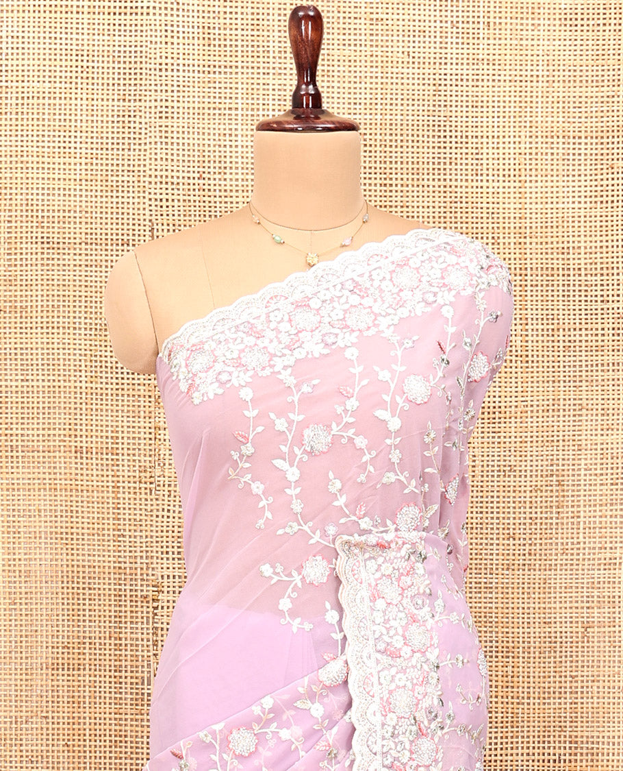 Pale Pink Designer Saree, Beautifully Bedecked with Floral Vine Embroidery, a Scallop Embroidered Border, and a Matching Blouse