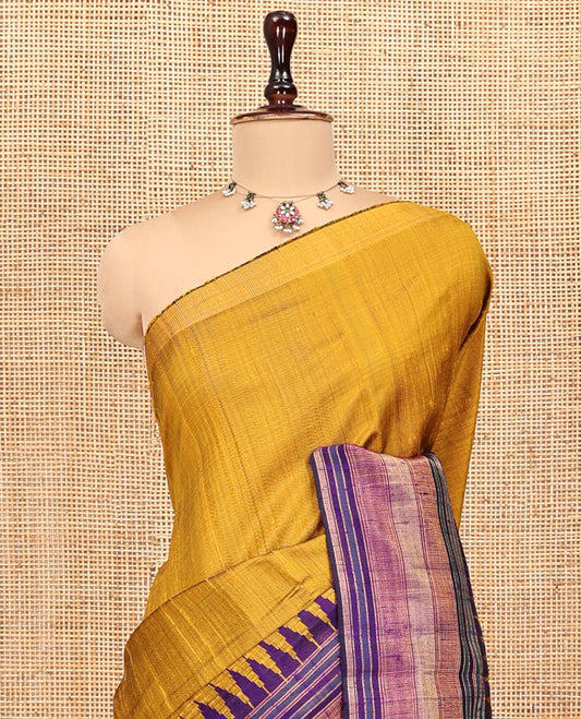 Mustard Plain Dupion Silk Saree, Complemented by a Contrast Temple Zari Border, Gleaming Striped Pallu, and a Contrast Blouse