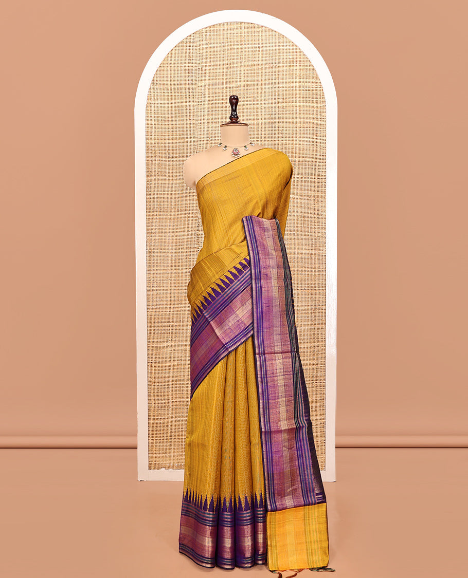 Mustard Plain Dupion Silk Saree, Complemented by a Contrast Temple Zari Border, Gleaming Striped Pallu, and a Contrast Blouse
