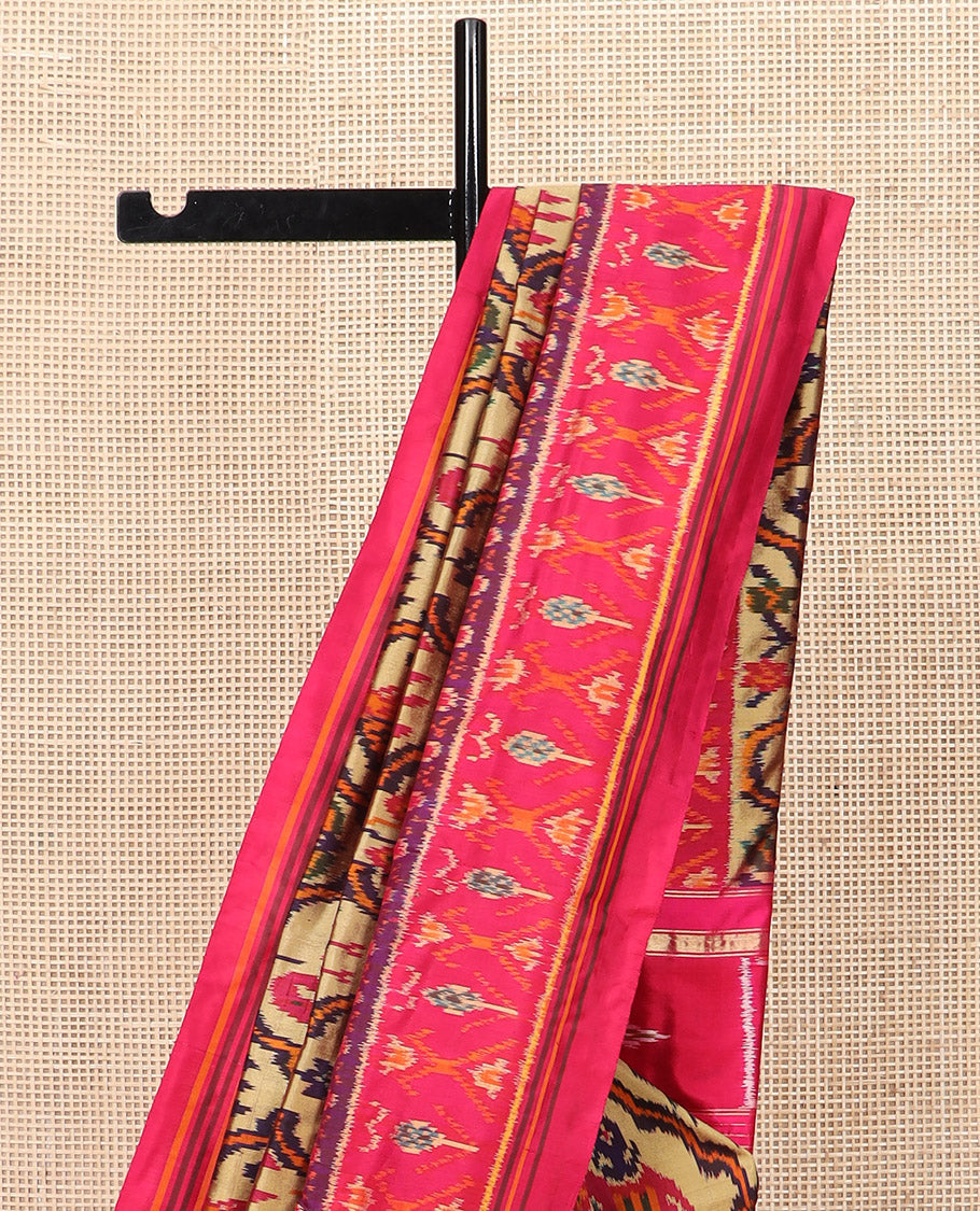 Sandal Ikkat Silk Saree Featuring Kaleidoscopic-Coloured Flora or Fauna Motifs Enclosed in Mughal Jaal, Complemented by a Contrast Ikkat Border, Adorned with a Pallu of Patola Fauna Motifs, and a Plain Contrast Blouse