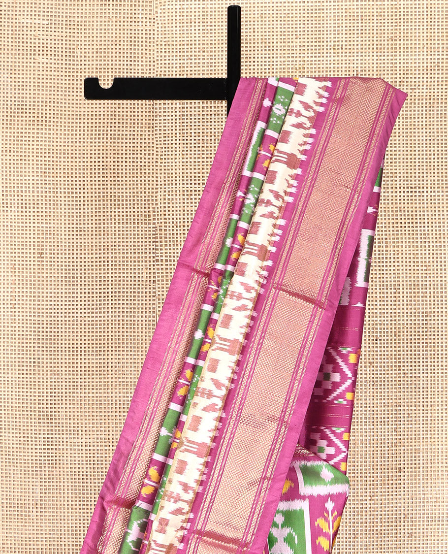 Pink Pochampally Ikat Silk Saree, Meticulously Woven with Ikat Enclosed Checks on Its Body, Highlighted by a Zari Border, Pallu of Jaal Pattern in Ikkat Weave, and Paired with a Matching Blouse
