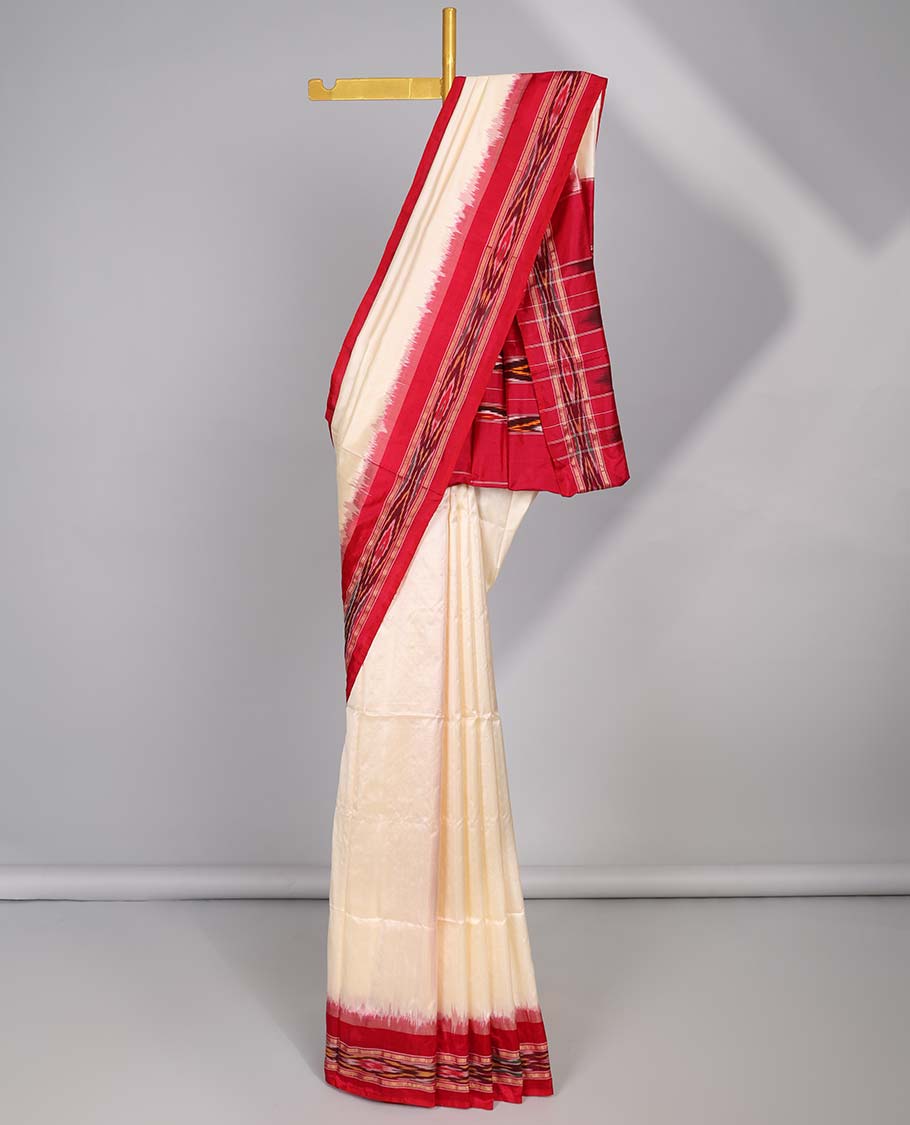 Cream ikkat silk saree with contrast striped border & striped design pallu