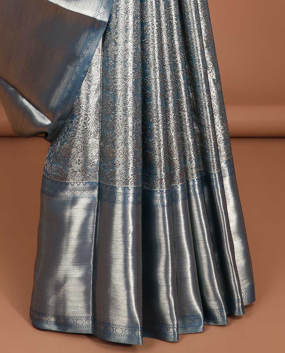 Blue floral jacquard tissue saree with contrast border of thilakam mokku, muthu, paun, banaras designs & floral jaal zari design pallu