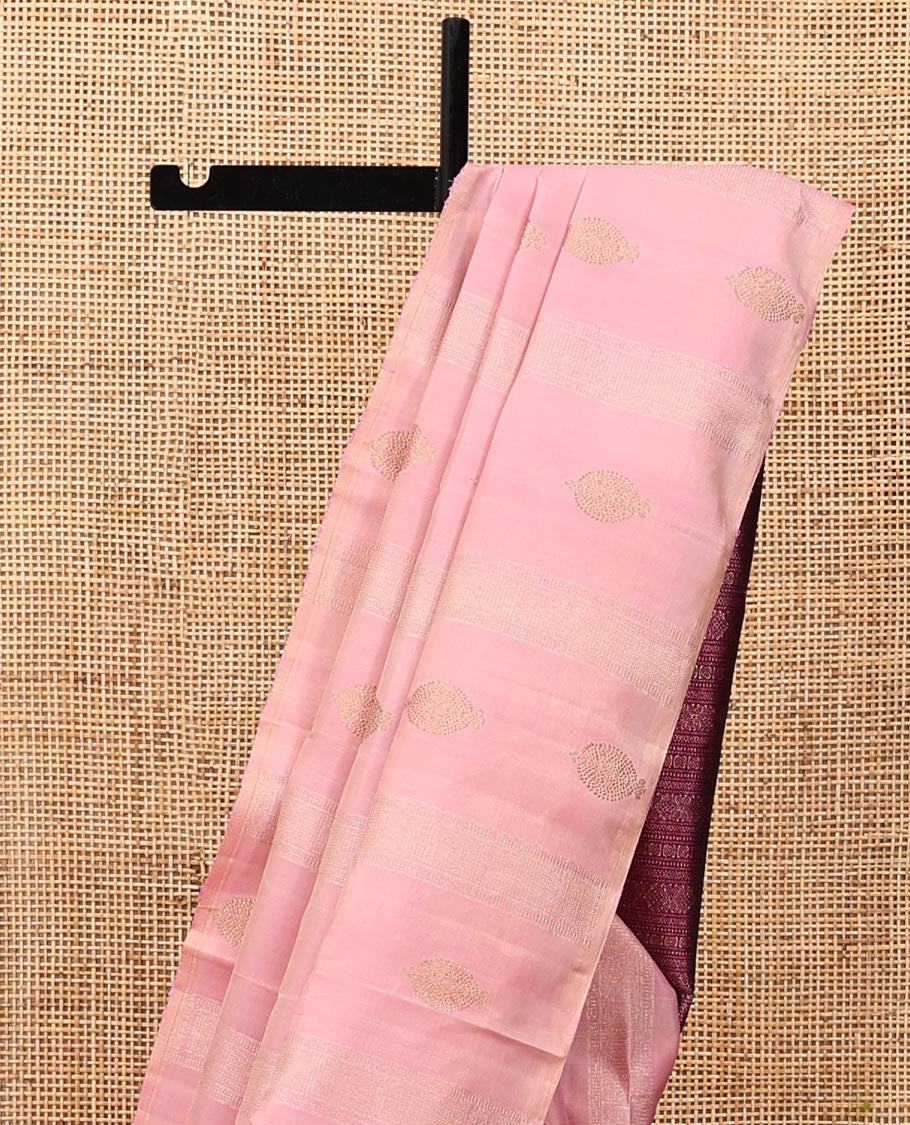 Borderless Pink Kanchipuram Designer Silk Saree, Artfully Detailed with Zari Buttas and Stripes, a Contrast Pallu Steeped with Geometric Designs, and a Contrast Blouse