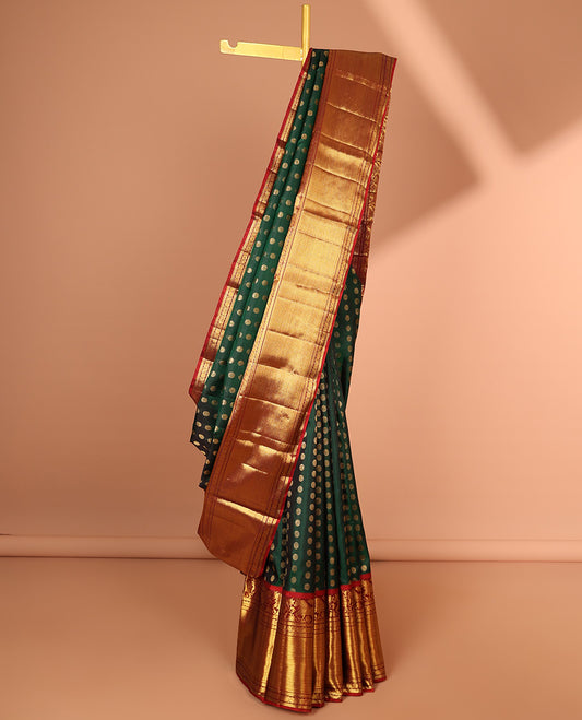 Green zari buttas Kanchipuram silk saree, contrast zari border of kuthirai design & pallu of rekku,poun,mayil & zari design